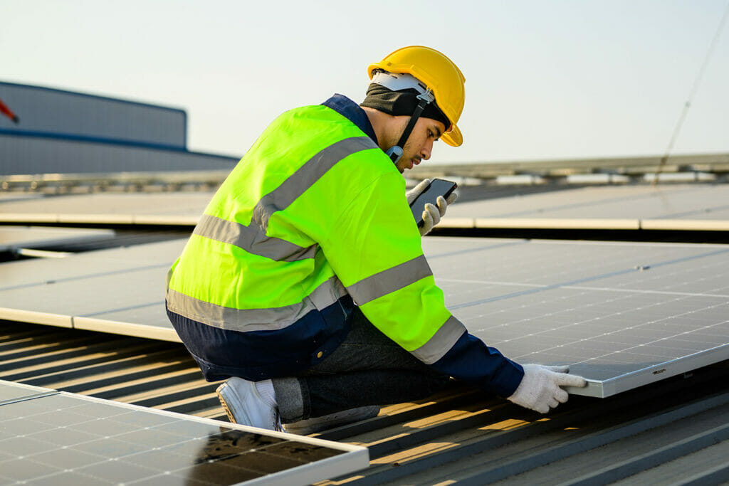 Image showing someone installing solar panels.